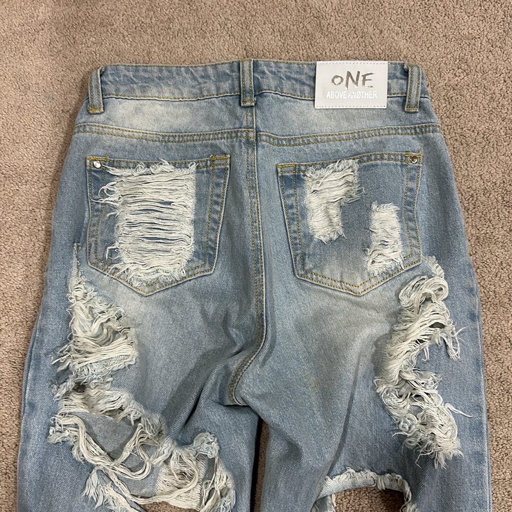 One Above Another Mom Jeans With Extreme Rips - Picture 4 of 4